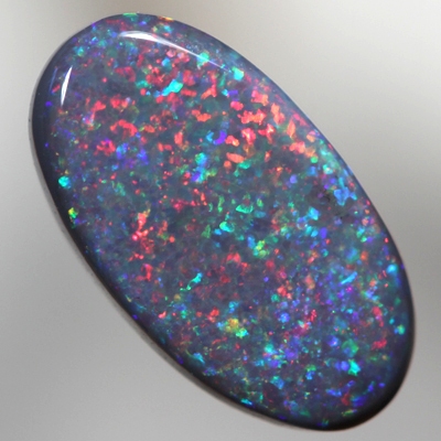 SOLID BLACK OPAL Bright red blue Pinfire pattern